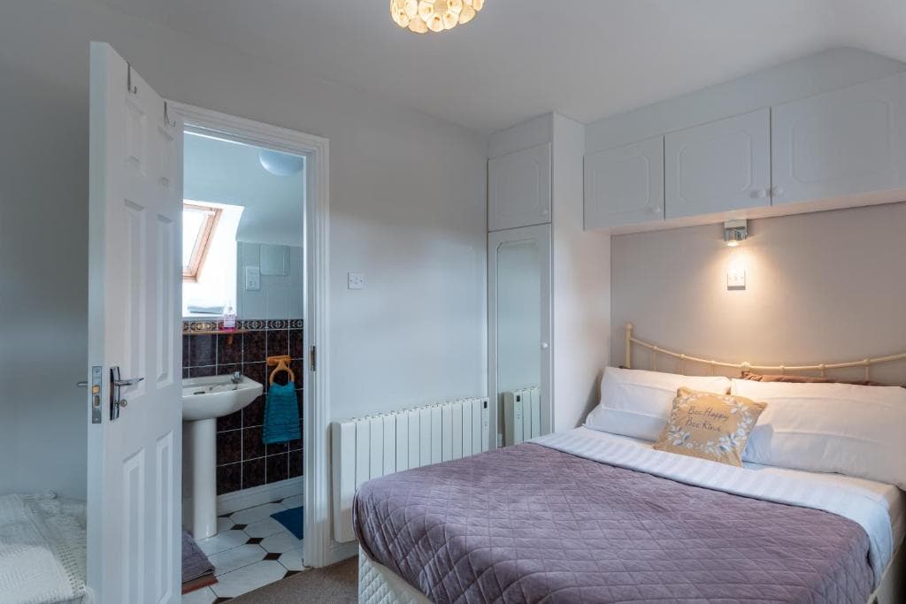 Bedroom 3 — double bed with views at Tully's Home